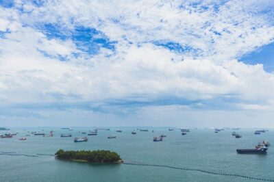 Aerial view of ships crossing the Strait of Malacca from Sentosa Island, Singapore