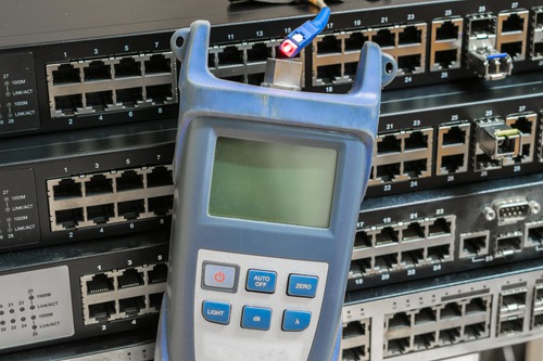 Optical time-domain reflectometer connected to fiber network equipment