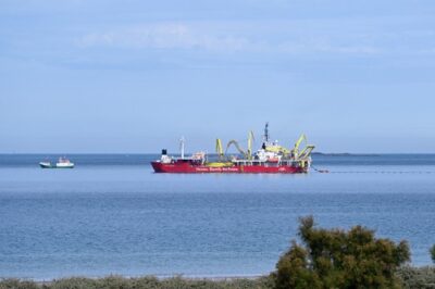 Cable-laying vessel at sea, illustrating LS Marine Solution's InterOcean newbuild