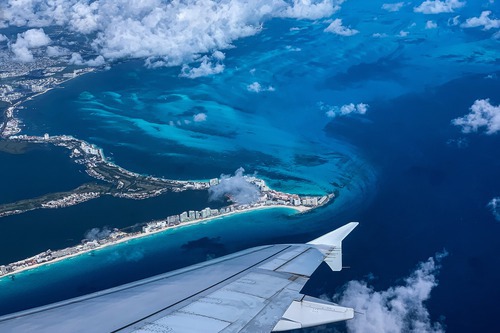 Aerial view of Cancun's Caribbean coastline, illustrating MDC's planned MANTA landing hub