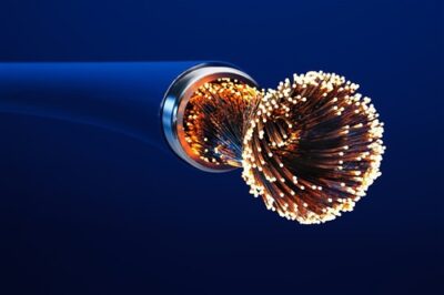 Illustration of illuminated optical fibers inside a cable