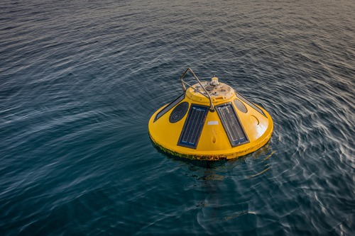 Oceanographic research buoy at sea, illustrating UNH's Appledore cabled observatory