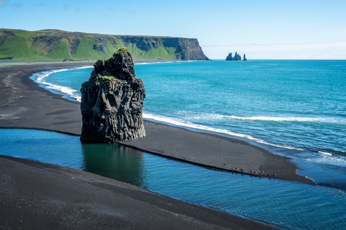 Reynisfjara on Iceland's south coast, illustrating the planned Auður cable landing region