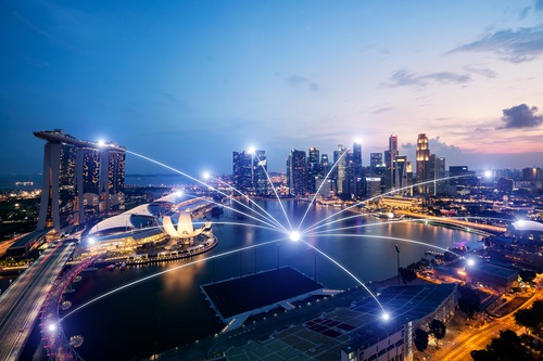 Singapore skyline with digital network connections representing MViSTA's Southeast Asian cable route
