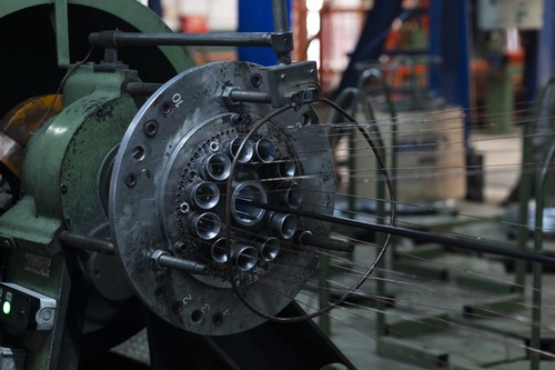 Cable production machinery illustrating Prysmian submarine telecom manufacturing