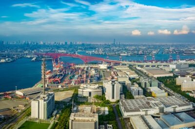 Illustrative aerial view of Osaka Bay near the broader Kansai region; not the Wakayama cable landing site
